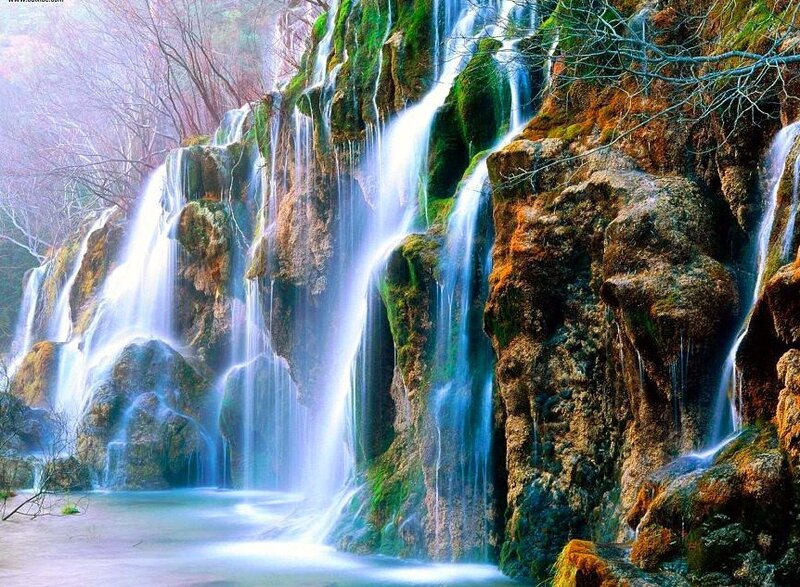 Waterfall on Rocky Cliff — Blue, Serene, Photograph