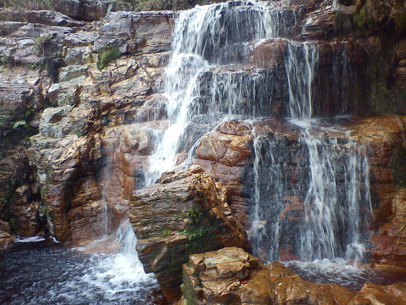 Waterfall on Rocky Cliff — Brown, Natural, Photograph