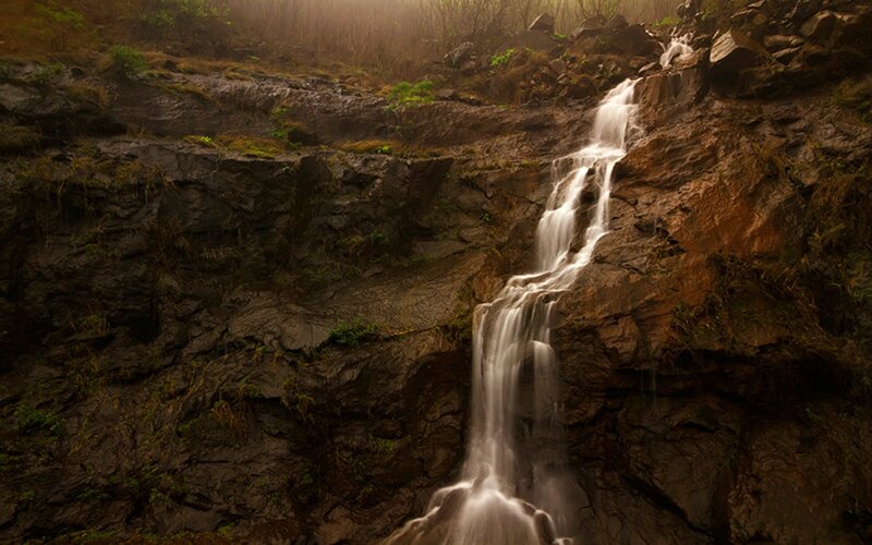 Waterfall on Rocky Cliff — Brown, Serene, Morning