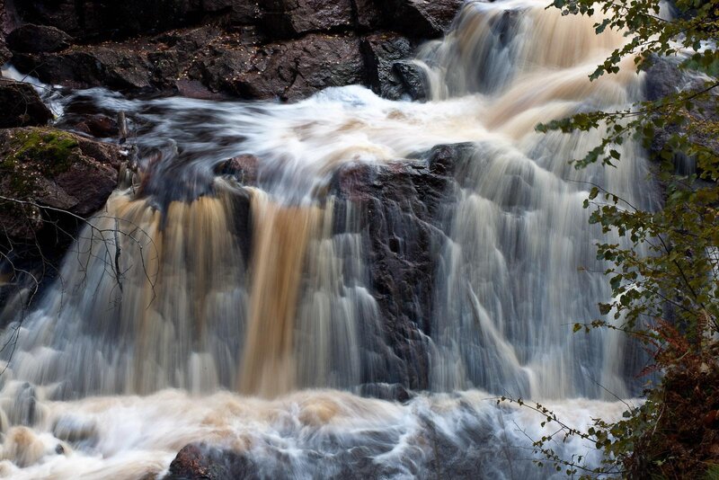Waterfall on Rocky Cliff — Brown