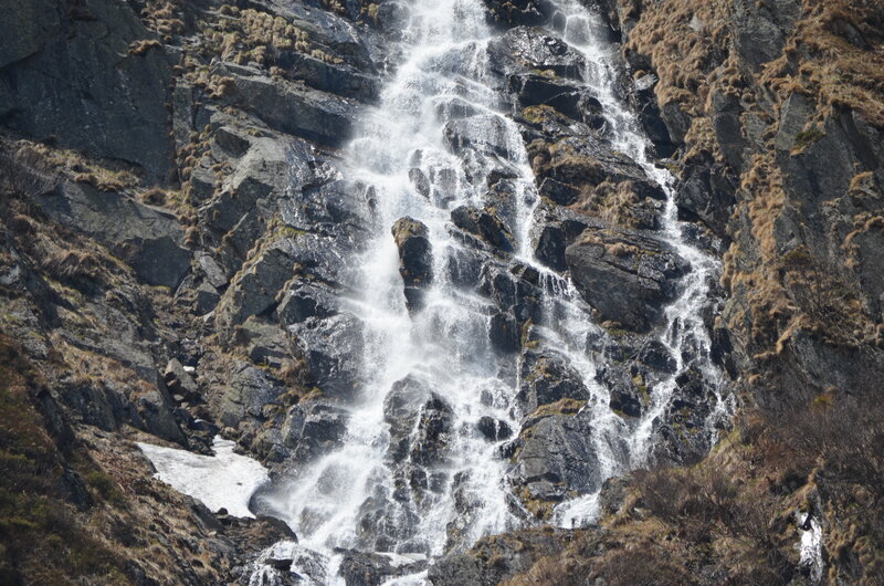 Waterfall on Rocky Cliff — Gray, Dramatic, Spring
