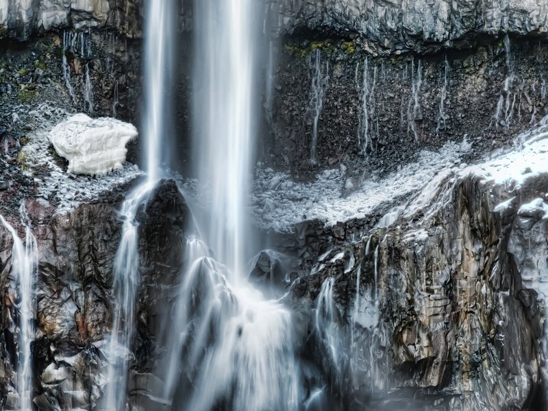 Waterfall on Rocky Cliff — Gray, Dramatic
