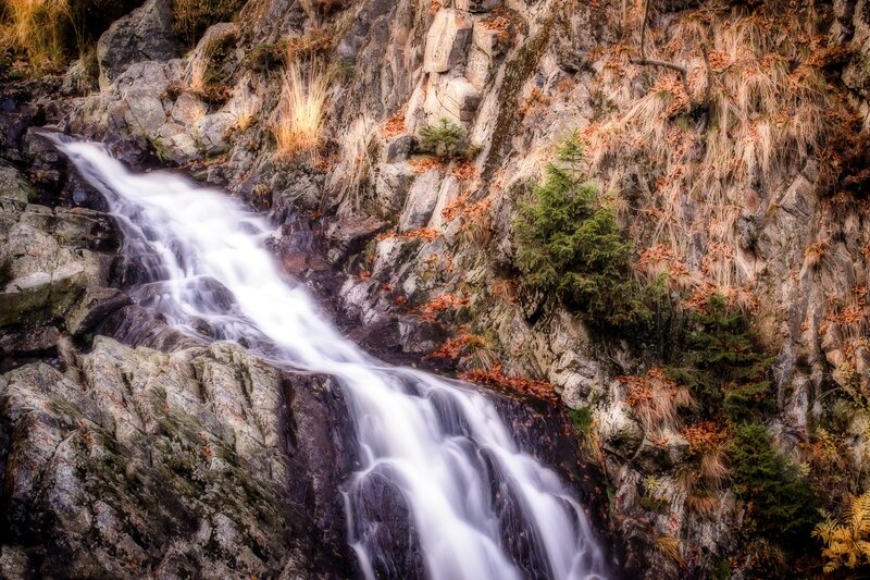 Waterfall on Rocky Cliff — Gray, Serene, Autumn, Photograph, Rocks, Trees