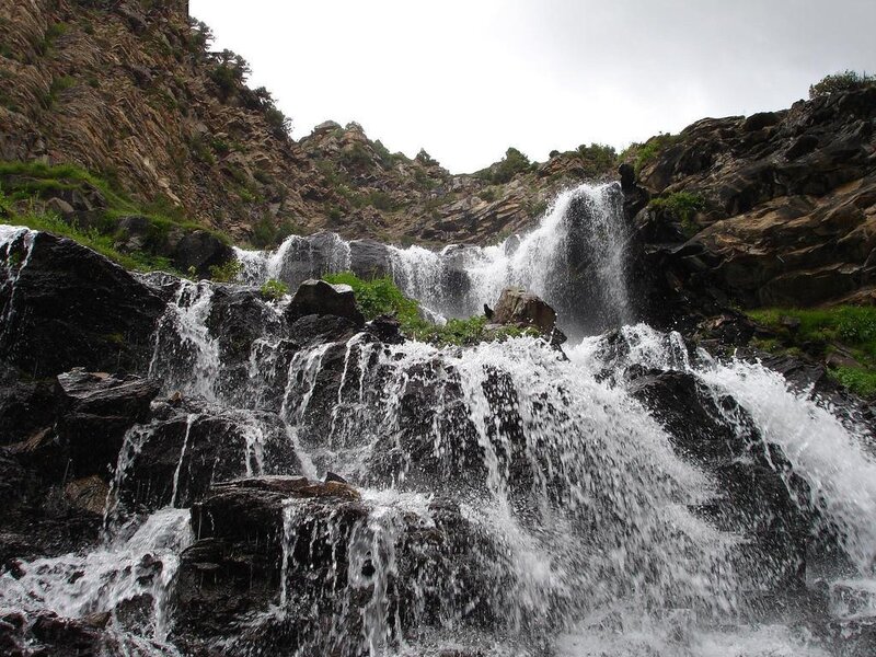 Waterfall on Rocky Cliff — Gray