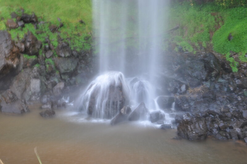 Waterfall on Rocky Cliff — Green, Calm