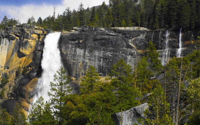 Waterfall on Rocky Cliff — Green, Dramatic, Afternoon, Photograph, Trees, Forest