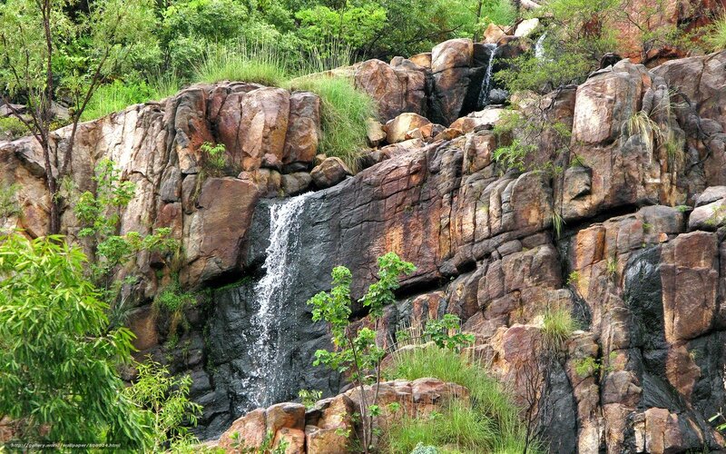 Waterfall on Rocky Cliff — Green, Natural, Afternoon, Photograph, Rocks, Trees, Grass