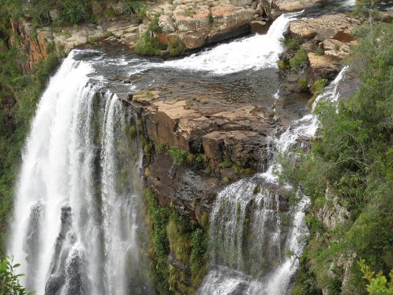 Waterfall on Rocky Cliff — Green, Natural, Photograph