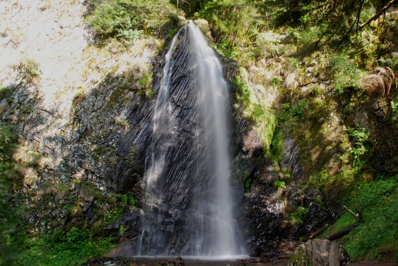 Waterfall on Rocky Cliff — Green, Serene, Afternoon, Photograph, Rocky Cliff, Trees