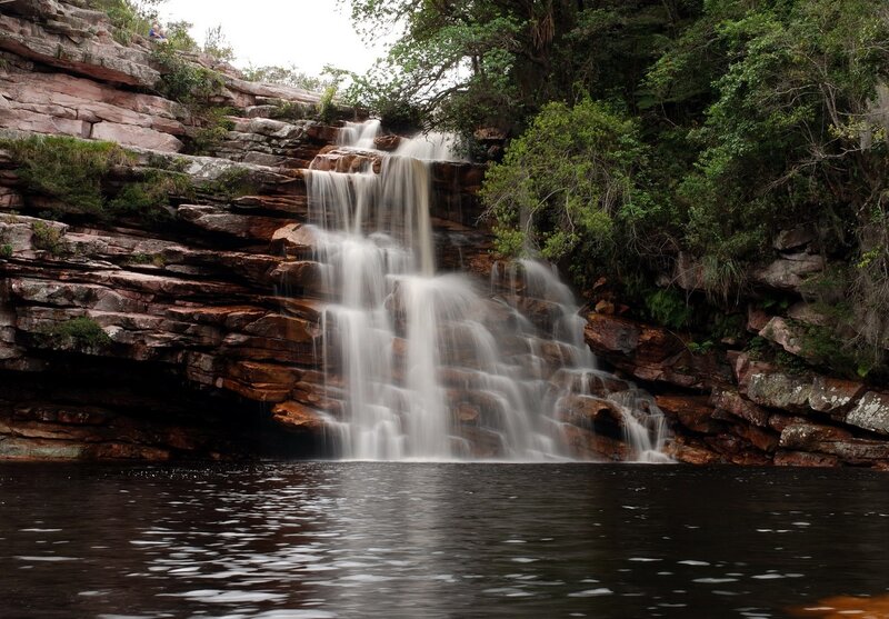 Waterfall on Rocky Cliff — Green, Serene, Afternoon, Photograph, Trees, Pool