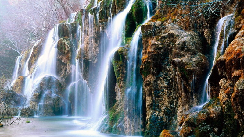 Waterfall on Rocky Cliff — Green, Serene, Morning