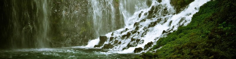 Waterfall on Rocky Cliff — Green, Serene, Photograph, Rocks, River, Vegetation