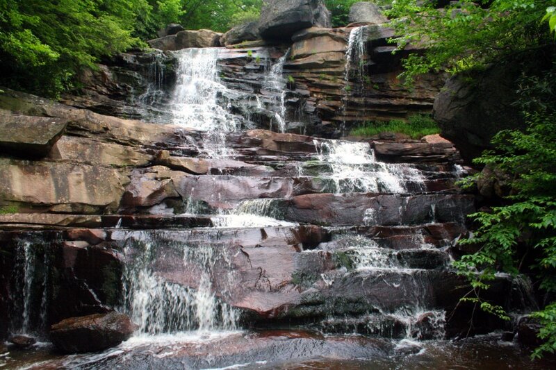 Waterfall on Rocky Cliff — Green, Serene, Summer, Photograph, Trees