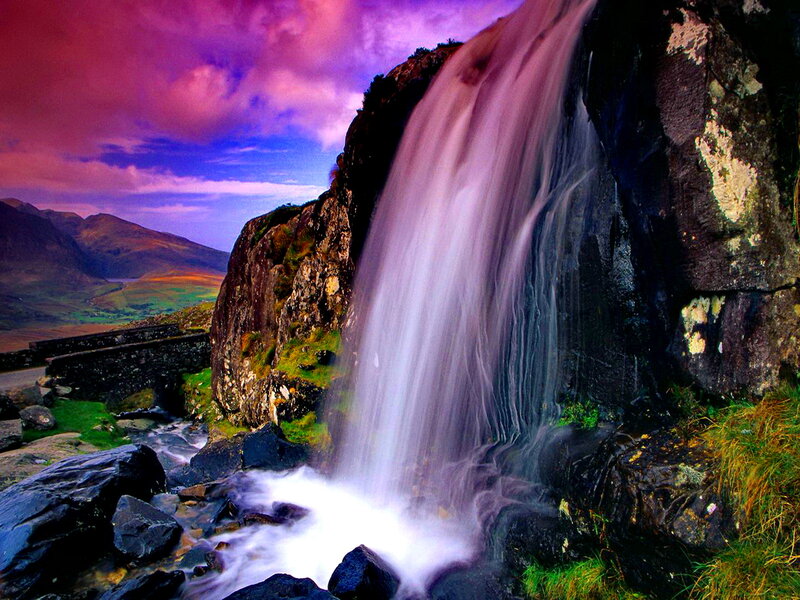 Waterfall on Rocky Cliff — Purple, Dramatic, Sunset