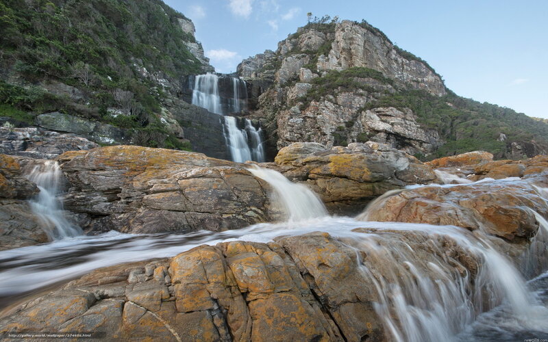 Waterfall on Rocky Coast — Brown