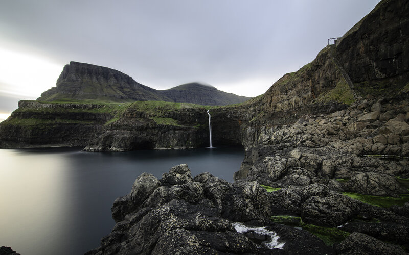 Waterfall on Rocky Coast — Gray