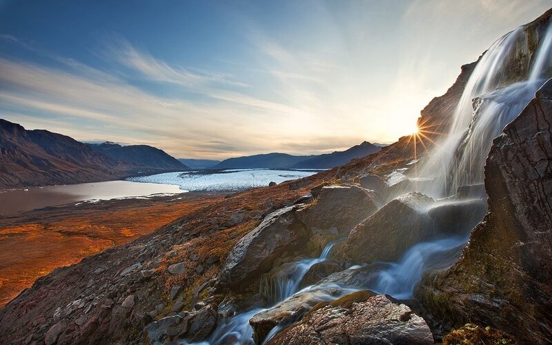 Waterfall on Rocky Hillside — Blue, Dramatic