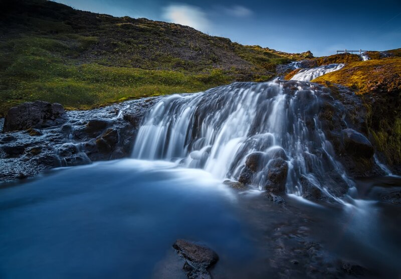 Waterfall on Rocky Hillside — Blue
