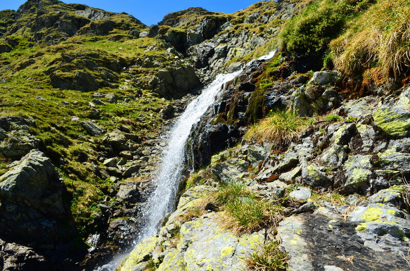 Waterfall on Rocky Hillside — Green
