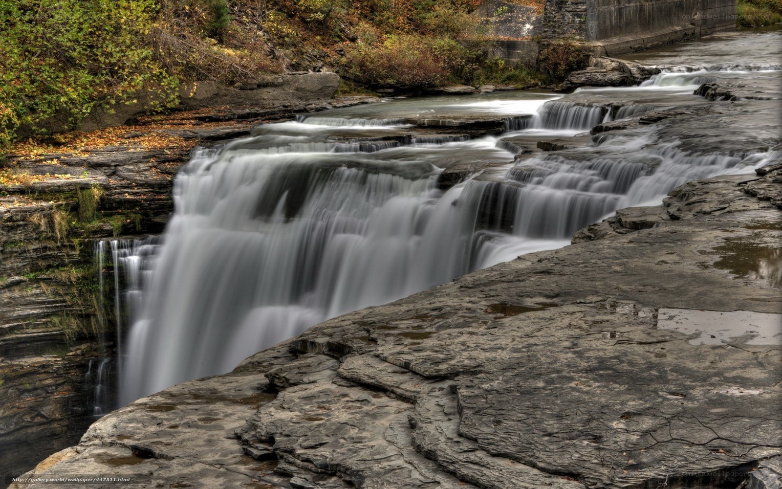 Waterfall on rocky river