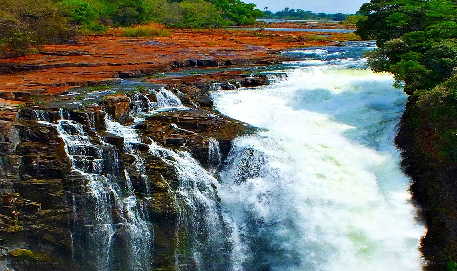 Waterfall on rocky riverbed