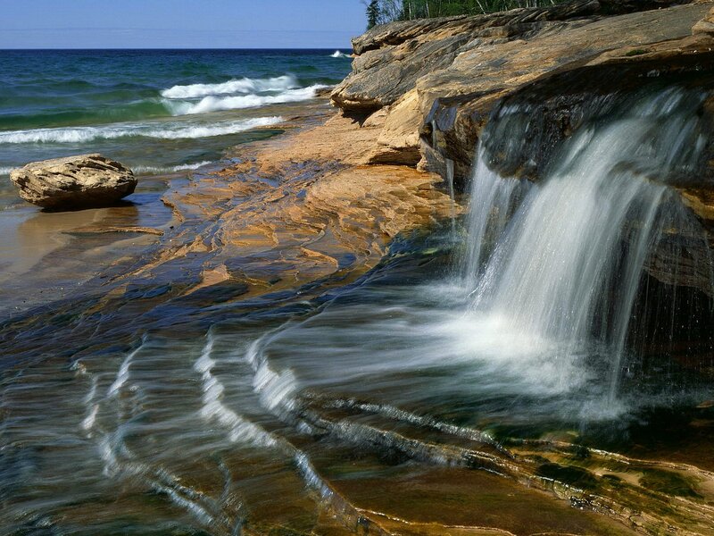 Waterfall on Rocky Shore — Blue, Serene