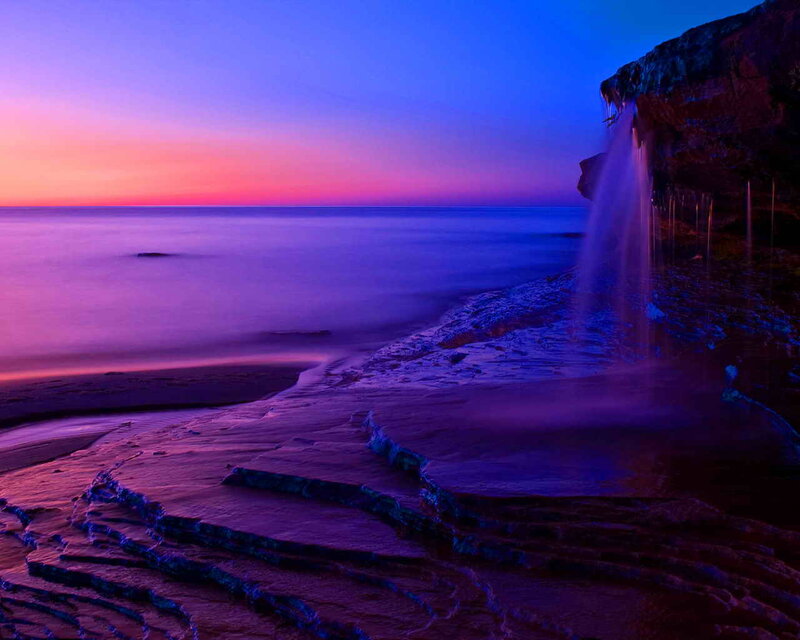 Waterfall on Rocky Shore — Purple, Serene