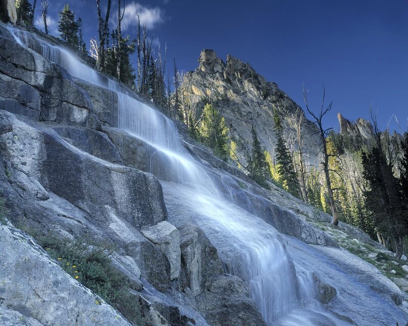 Waterfall on Rocky Slope — Blue, Serene, Afternoon