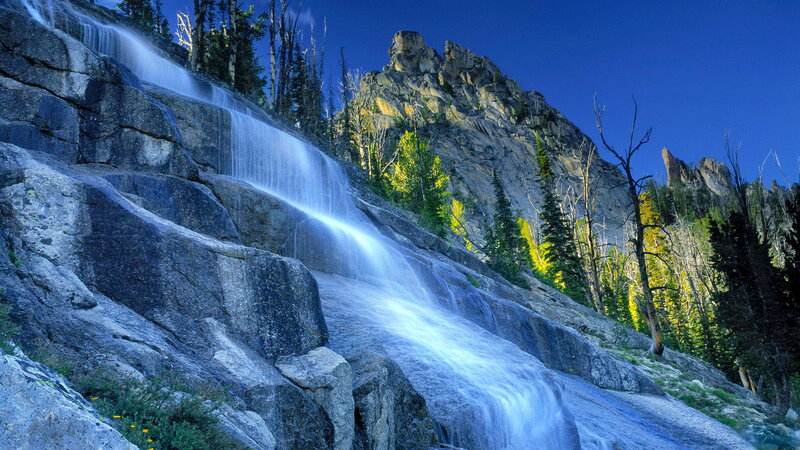 Waterfall on Rocky Slope — Blue, Serene, Morning