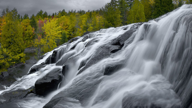Waterfall on Rocky Slope — Green, Dramatic