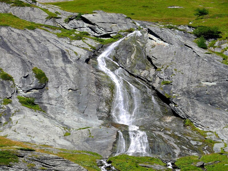 Waterfall on Rocky Slope — Green, Serene, Afternoon, Photograph, Rock
