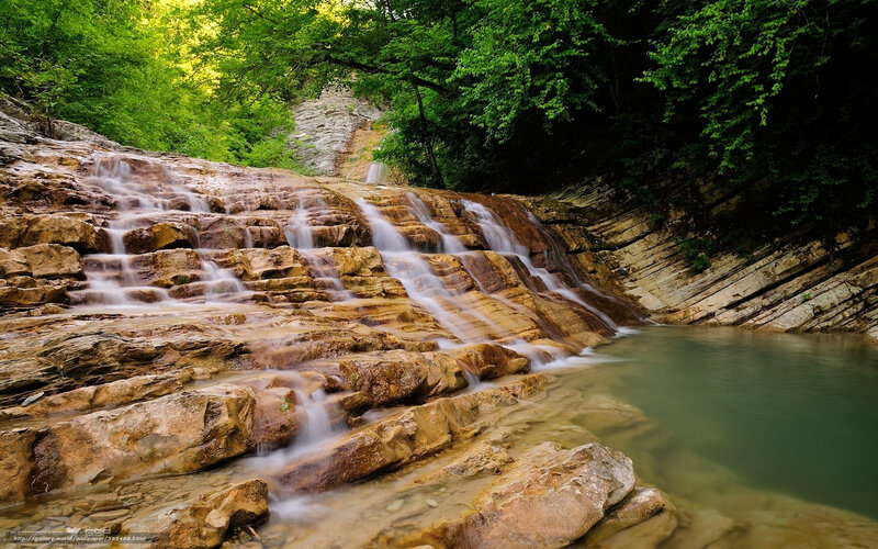 Waterfall on Rocky Slope — Green, Serene, Afternoon, Photograph, Trees, Rocks