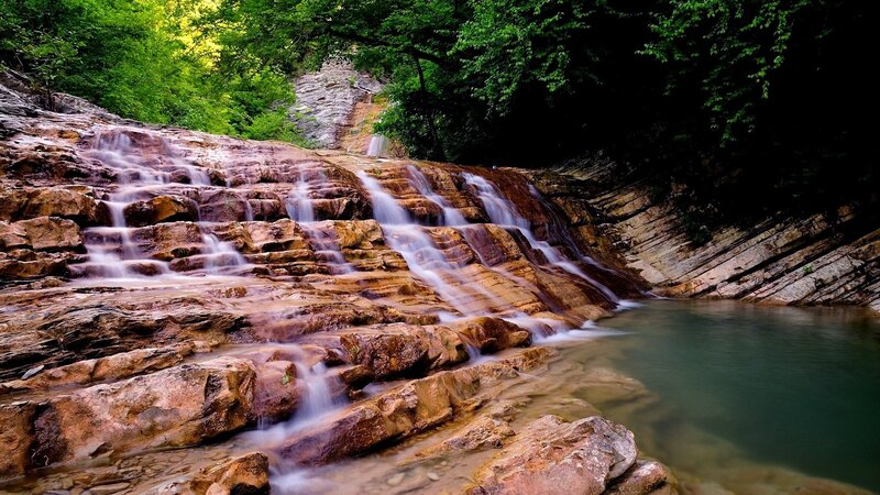 Waterfall on Rocky Slope — Green, Serene, Afternoon, Photograph, Trees