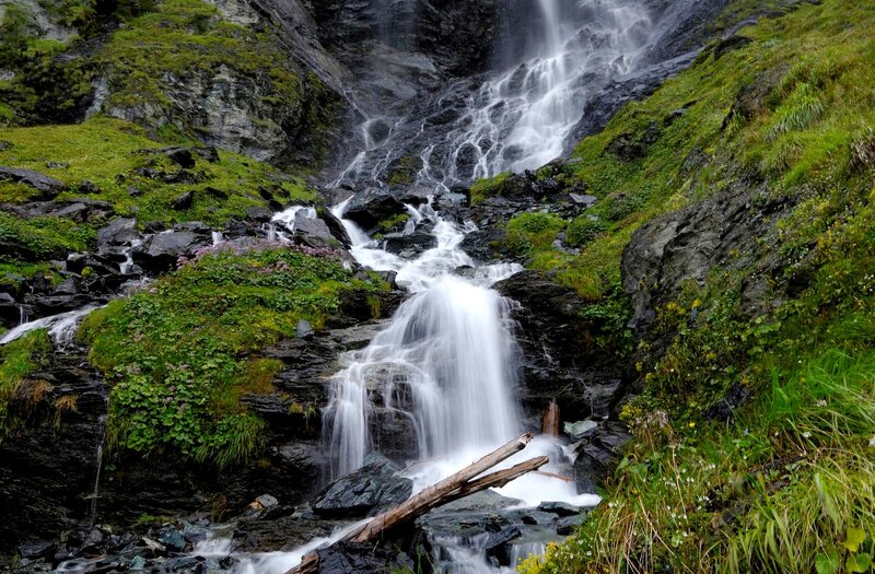Waterfall on Rocky Slope — Green, Serene, Photograph