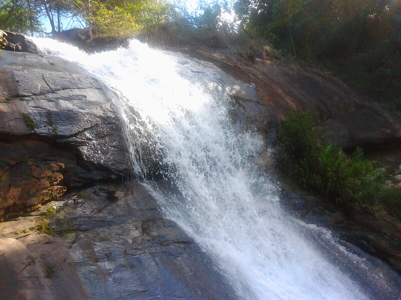 Waterfall on Rocky Slope — White