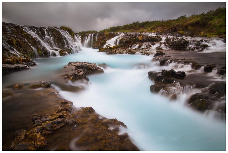 Waterfall on Rocky Terrain — Blue
