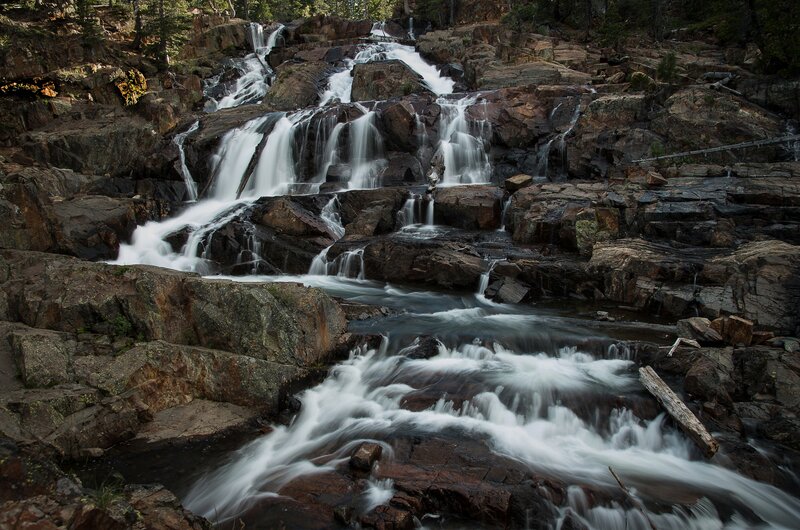 Waterfall on Rocky Terrain — Brown, Serene