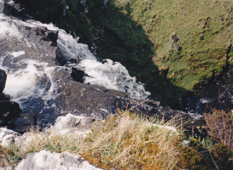 Waterfall on rocky terrain