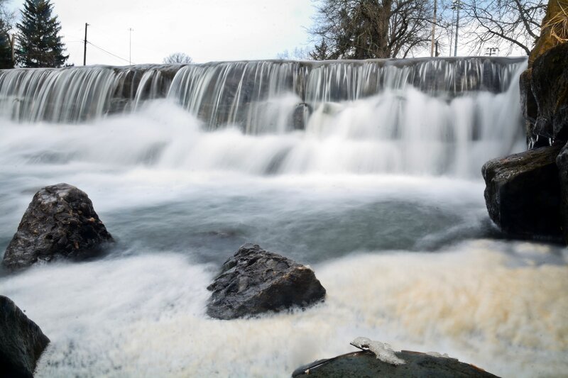 Waterfall over Dam — White