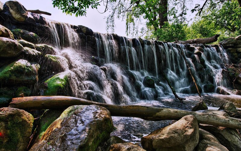 Waterfall over Mossy Rocks — Green, Serene, Afternoon