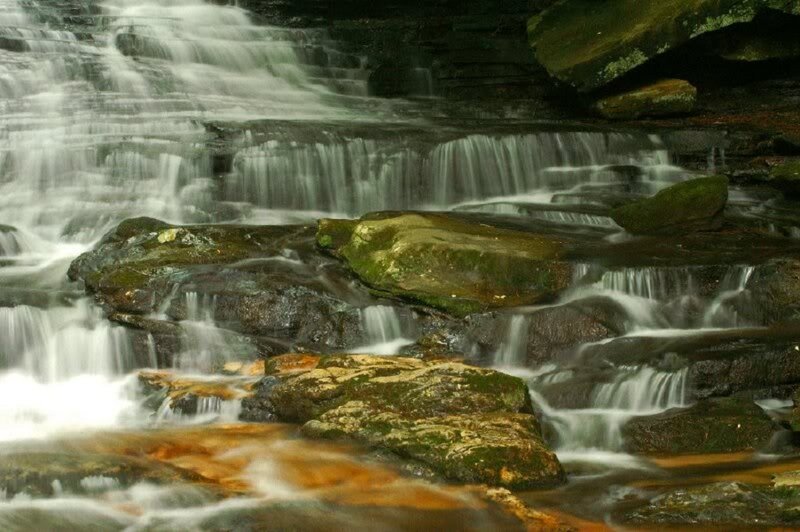 Waterfall over Mossy Rocks — Green, Serene