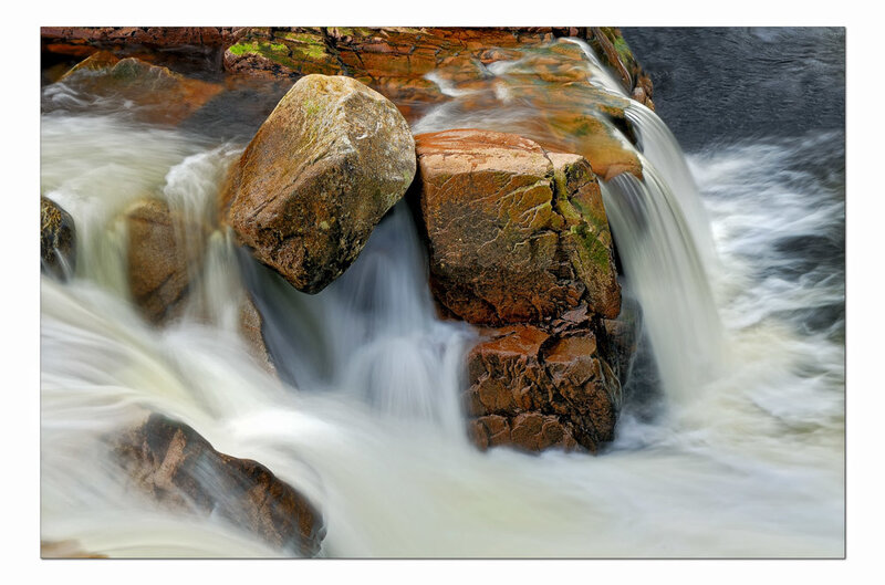Waterfall over Rocks — Brown