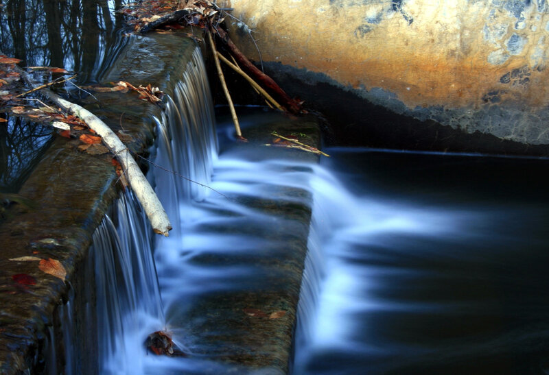 Waterfall over stone steps