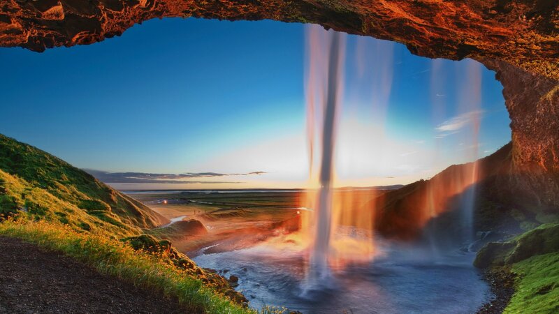 Waterfall Through Cave Arch — Blue, Dramatic