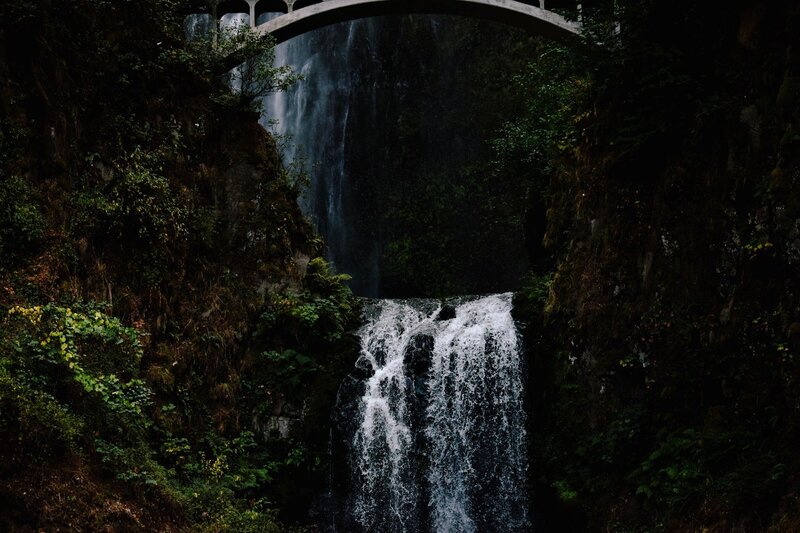 Waterfall under Bridge — Green, Dramatic