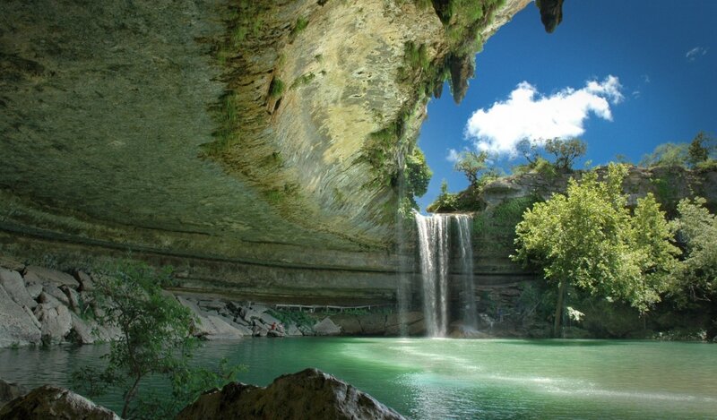 Waterfall under Rock Overhang — Green, Serene, Afternoon