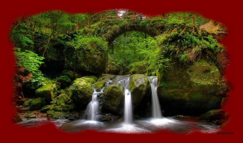 Waterfall under Stone Bridge — Green, Serene, Afternoon