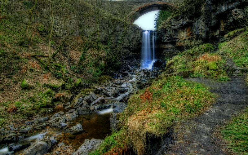 Waterfall under Stone Bridge — Green, Serene, Autumn