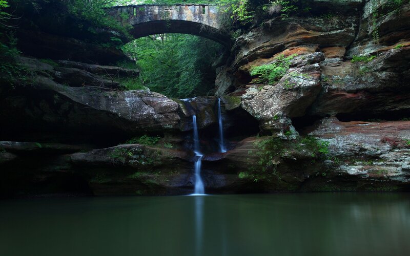 Waterfall under Stone Bridge — Green, Serene, Photograph