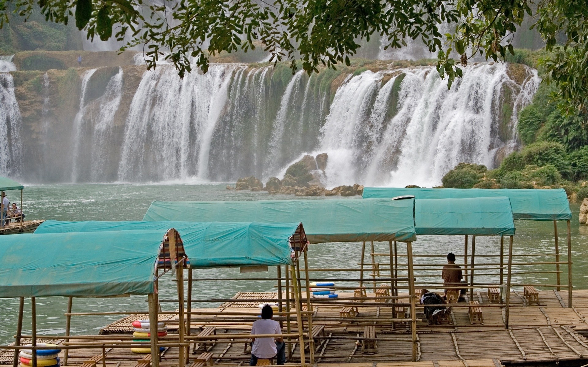 Waterfall with bamboo rafts
